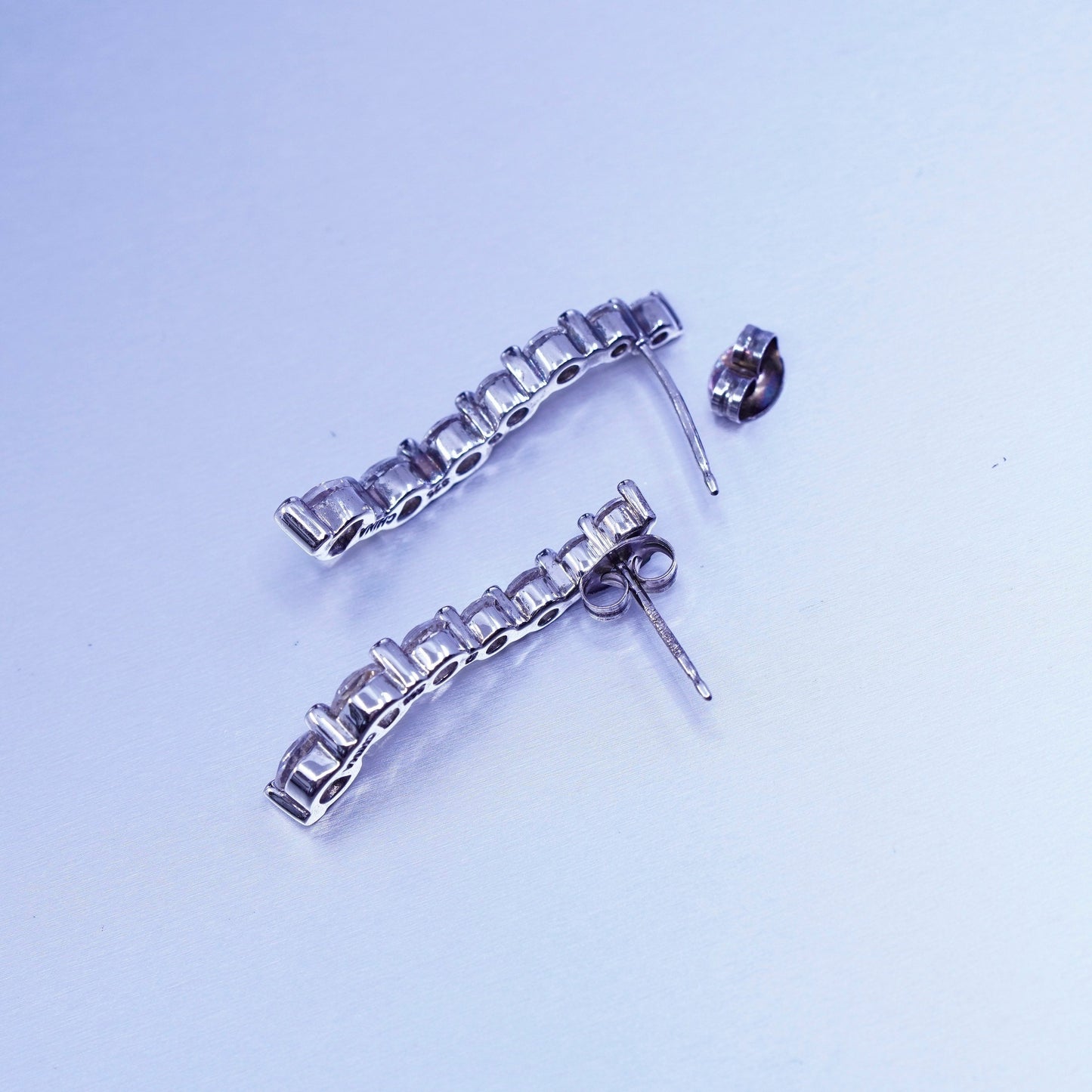 Vintage Sterling 925 silver earrings, wavy studs with Cz inlay