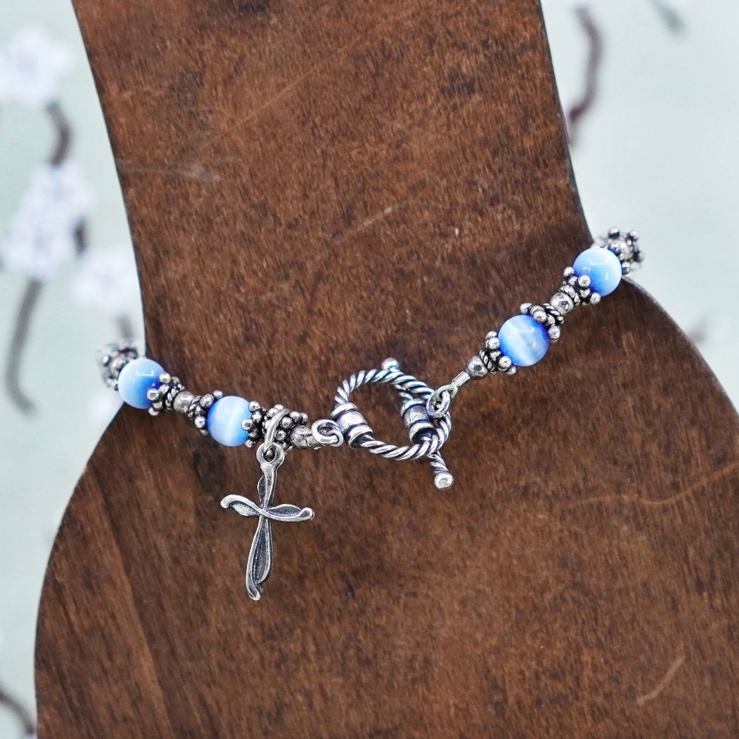 6”, Mexico 925 sterling silver bracelet with blue cats eye bead and cross charm