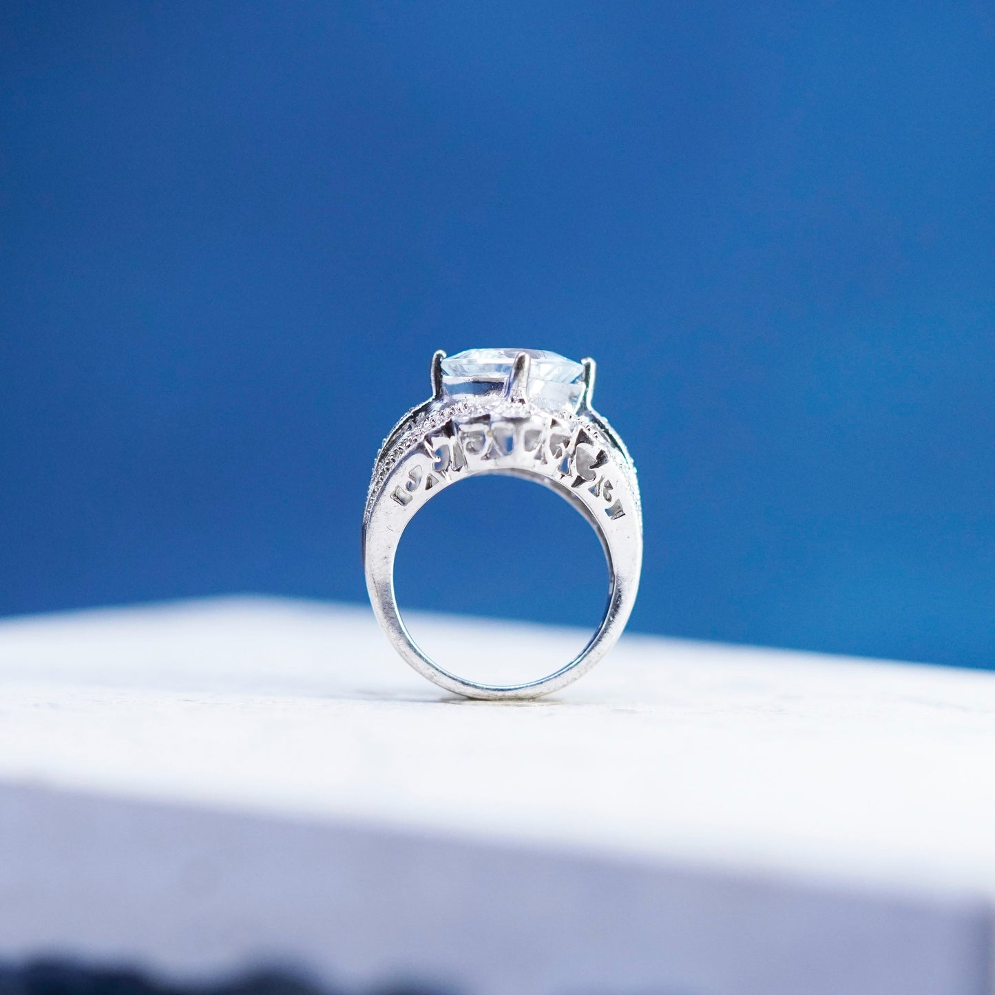 Size 4.75, vintage Sterling 925 silver engagement ring with cluster Cz around