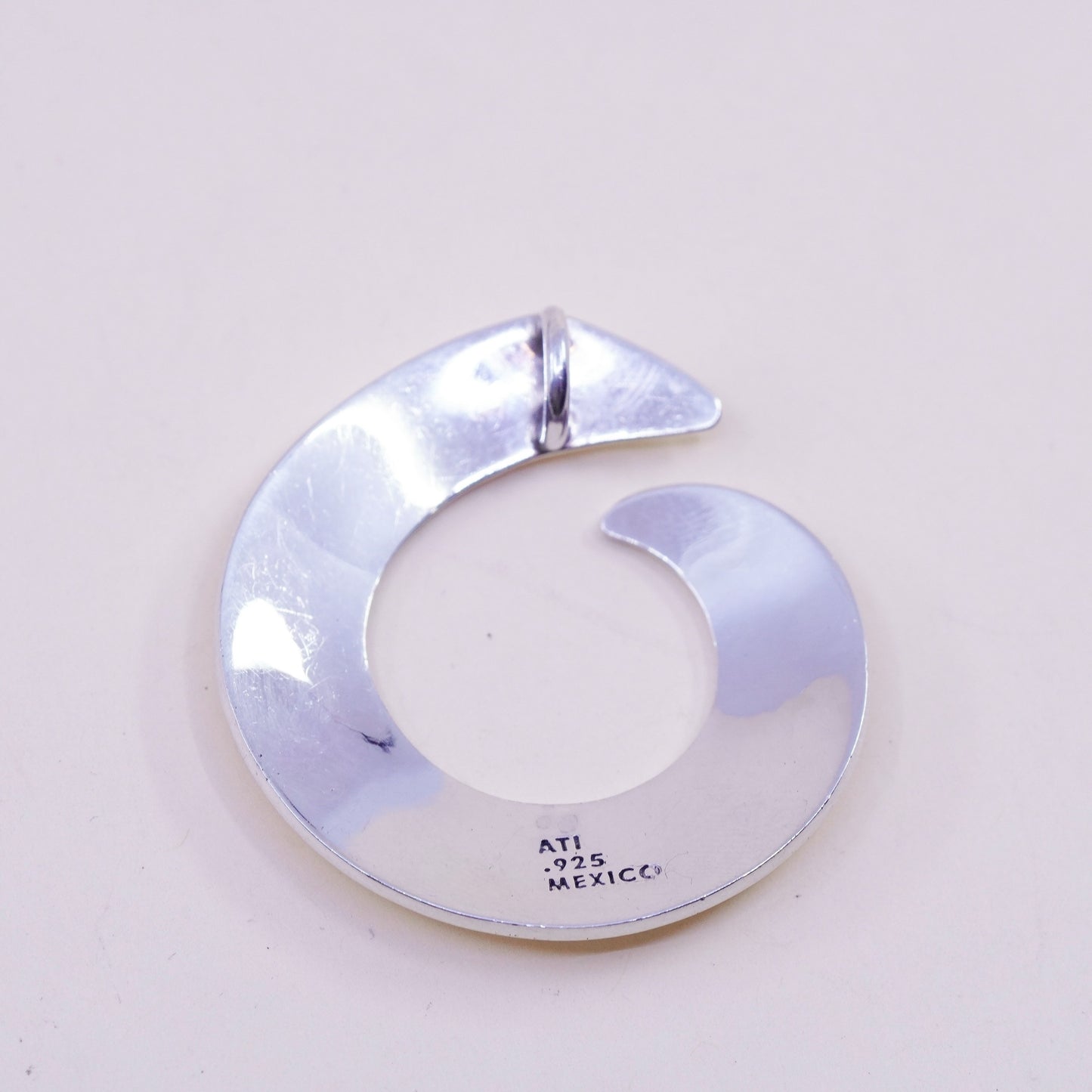 Vintage sterling 925 silver handmade hammered pendant with wave swirl