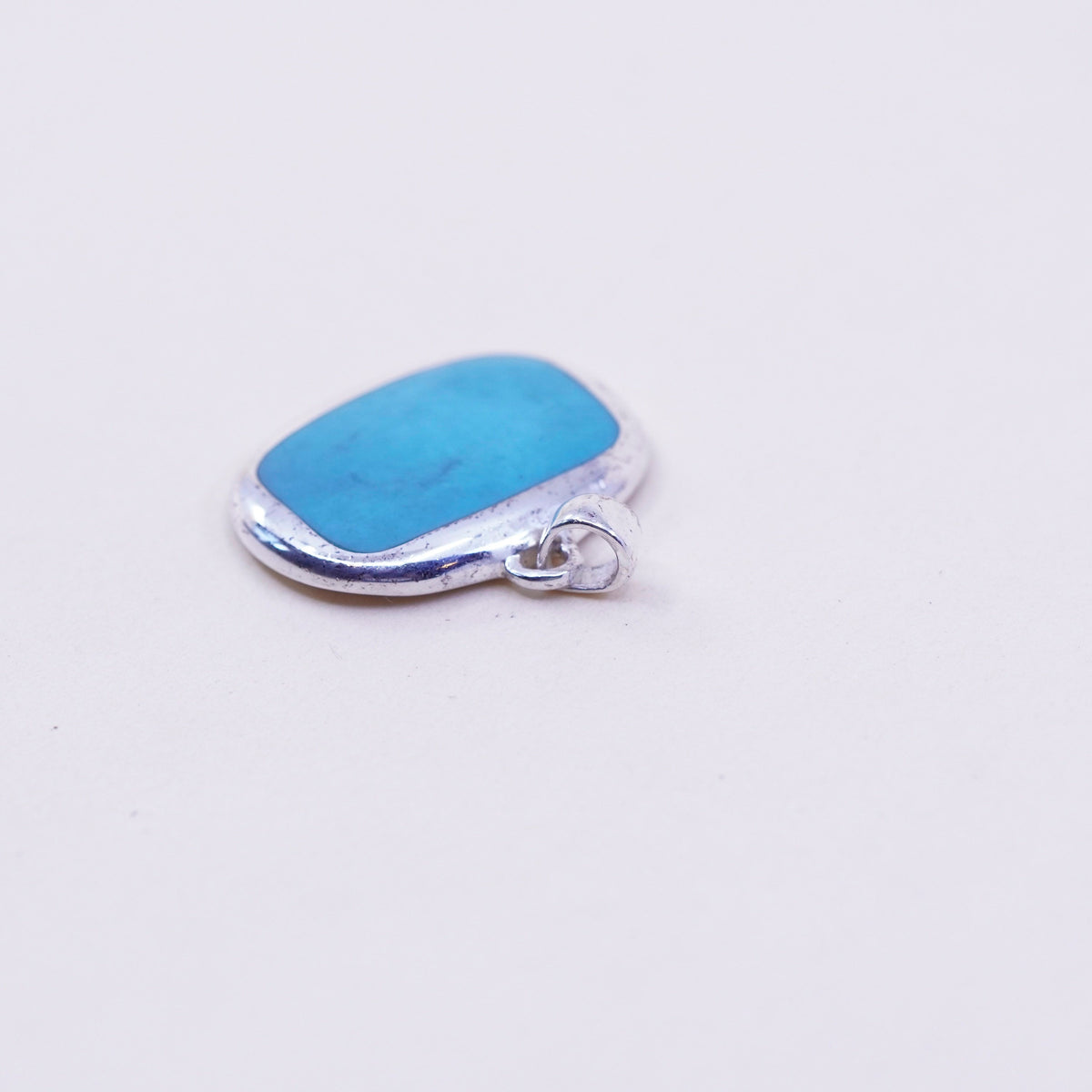 Vintage sterling 925 silver handmade pendant with square turquoise