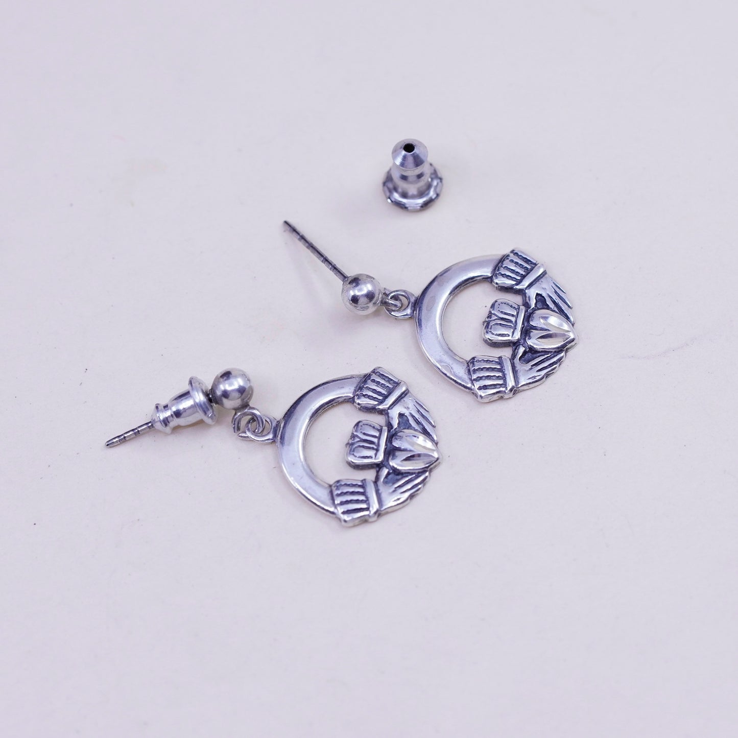 Vintage Sterling silver handmade earrings, 925 claddagh holding heart dangles