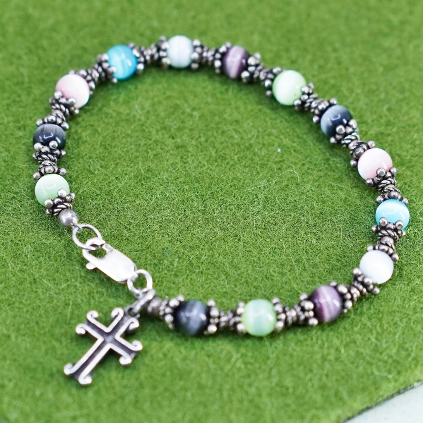 6.75”, sterling silver bracelet, 925 beads with colorful cats eye cross charm