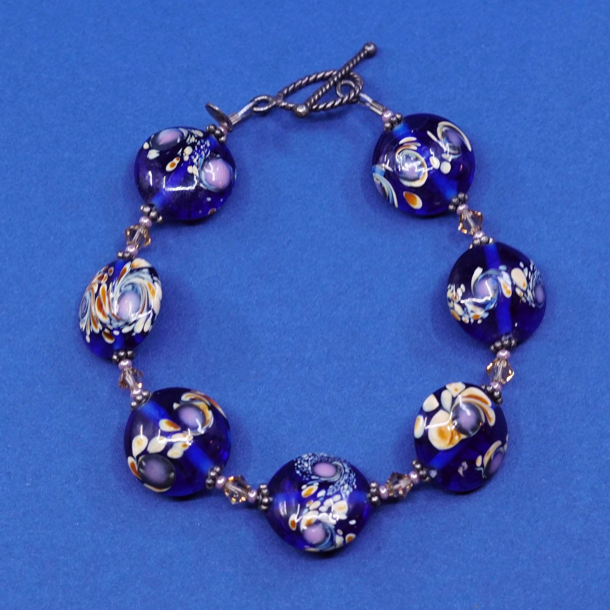 6.5", vtg handmade brass bracelet, brass toggle closure w/ flower glass beads