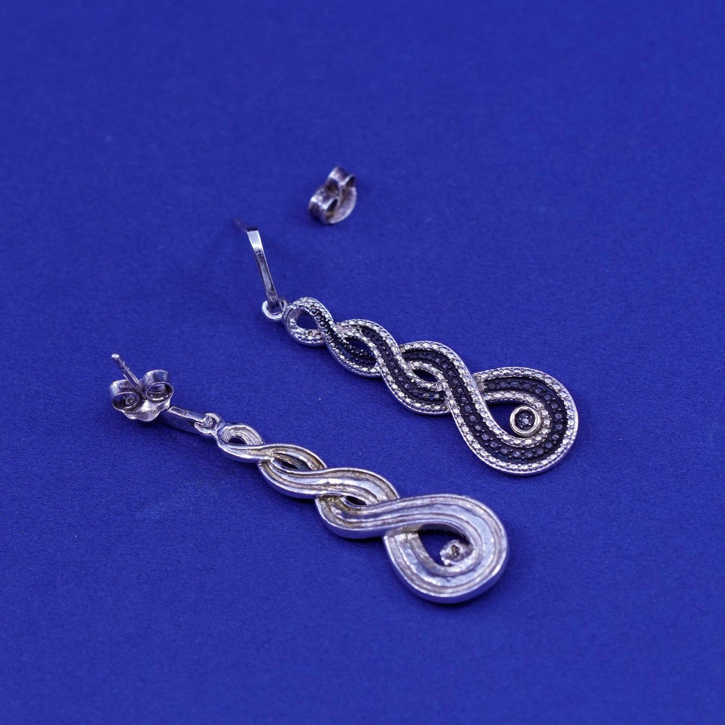 Two Tone Sterling 925 silver entwined earrings with 14K gold accent diamond