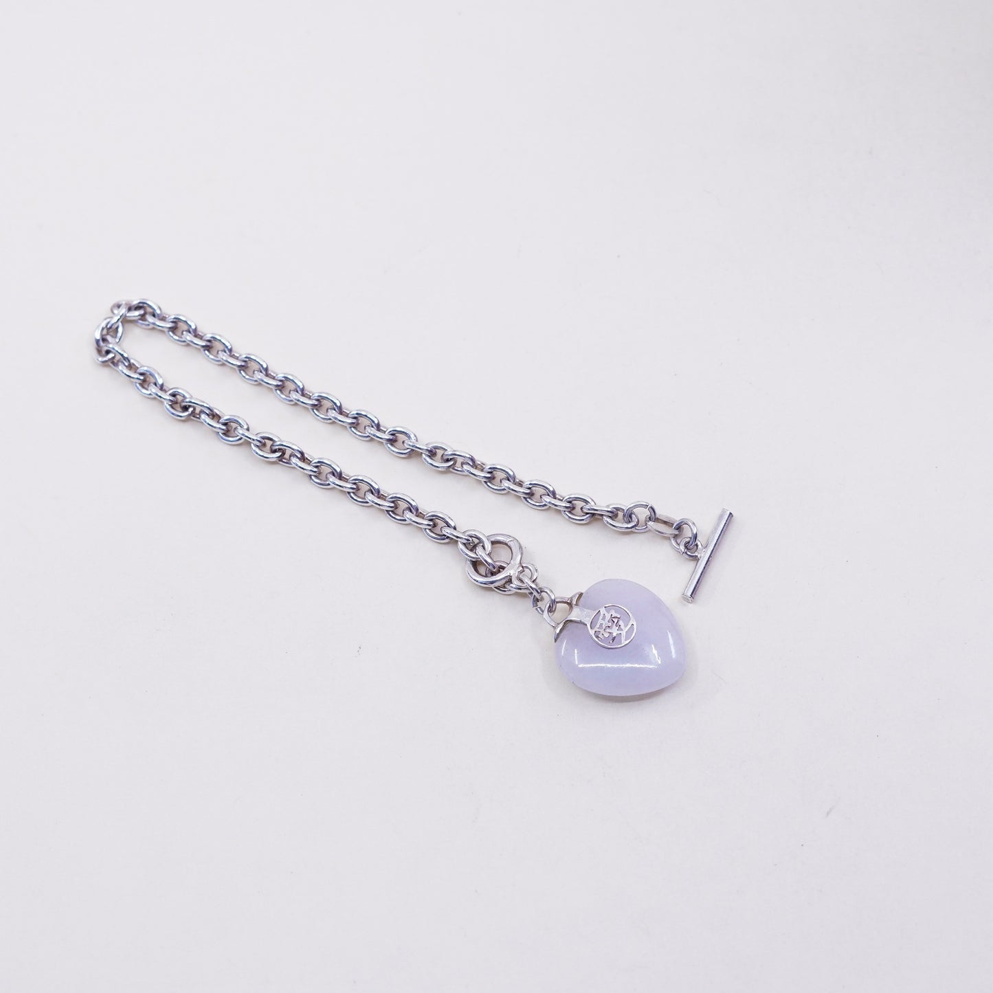 6.75”, sterling 925 silver circle bracelet w/ heart jade charm and “love”