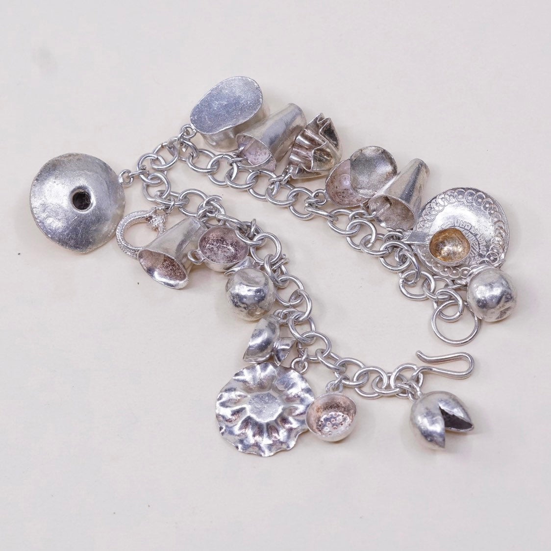 6.75”, sterling silver Handmade circle bracelet w/ cheese pot hat cup sombrero