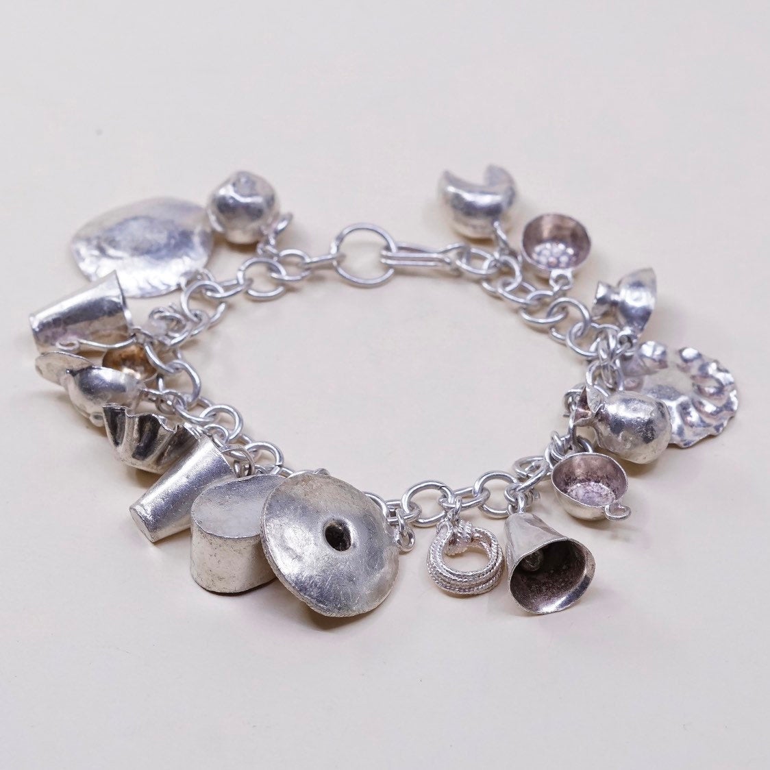 6.75”, sterling silver Handmade circle bracelet w/ cheese pot hat cup sombrero