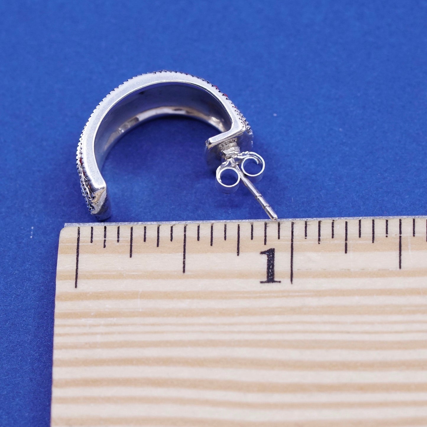 0.75”, Sterling silver earrings, 925 Huggie hoops w/ marcasite ruby Sapphire