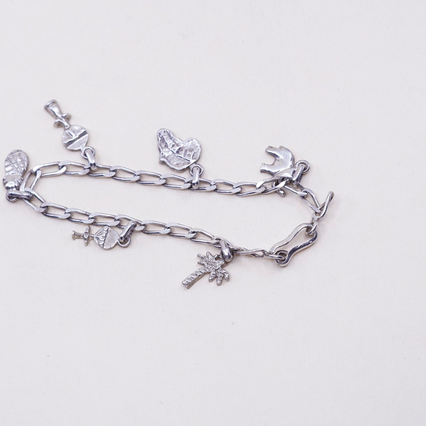 7”,, sterling 925 silver curb bracelet w/ palm tree pineapple elephant charms