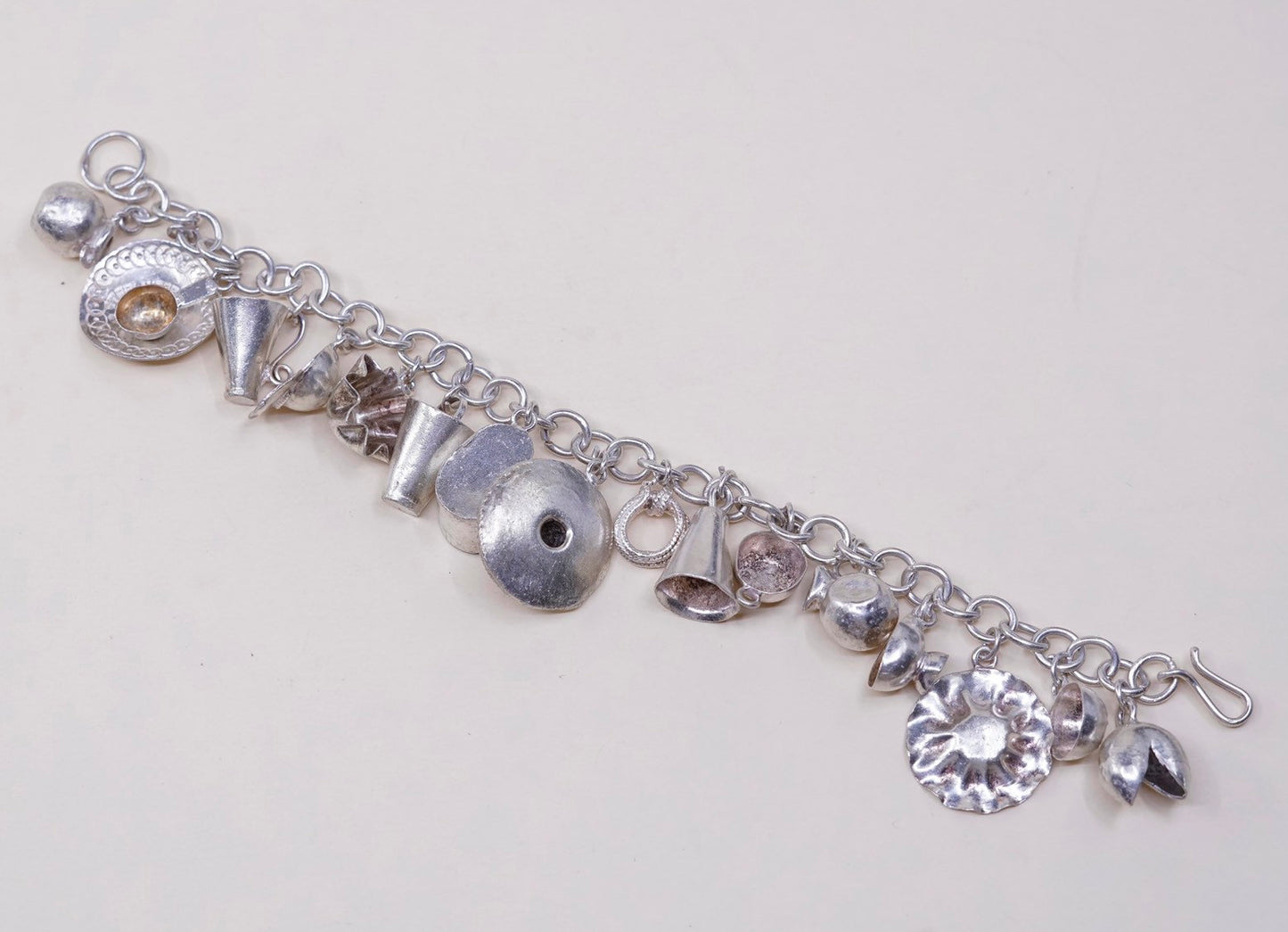 6.75”, sterling silver Handmade circle bracelet w/ cheese pot hat cup sombrero