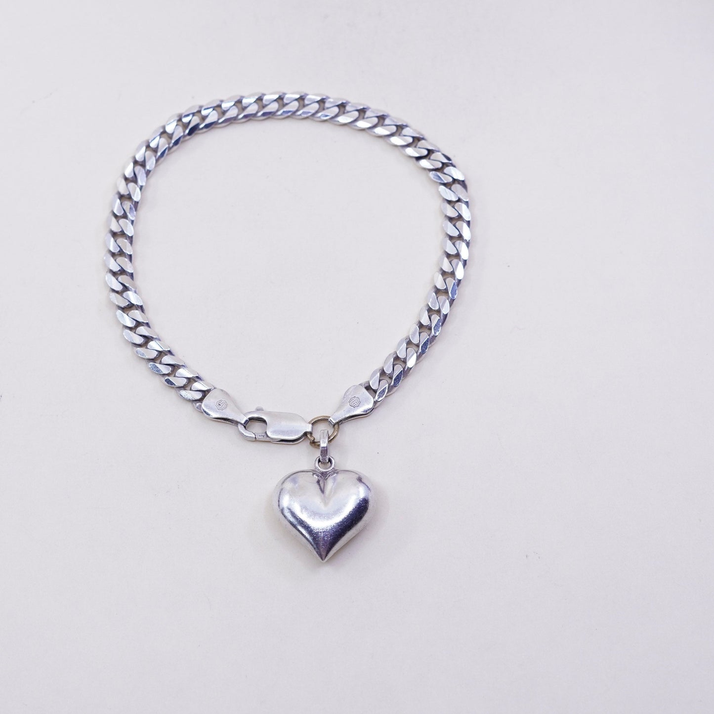 7.75”, sterling silver flatten curb bracelet, bold 925 chain with heart charm