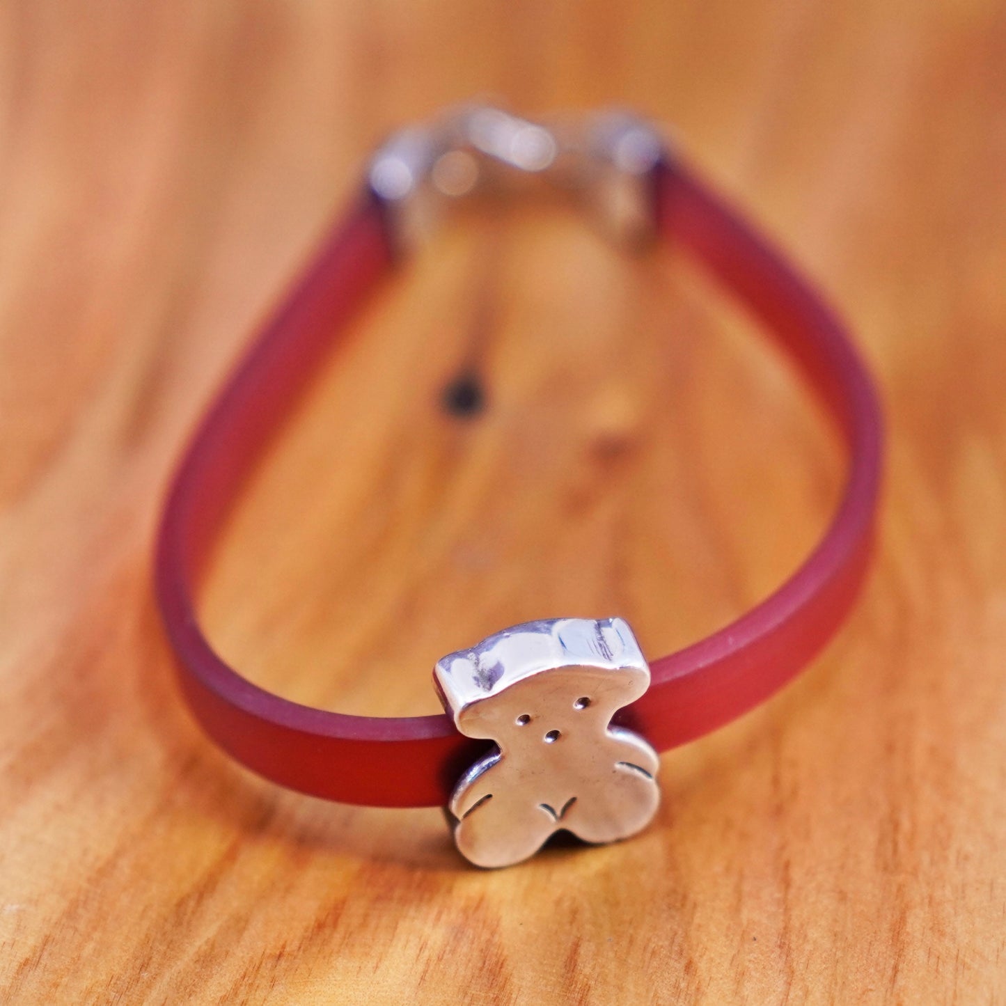 6.5”, vintage AG red rubber bracelet with sterling 925 silver teddy bear charm