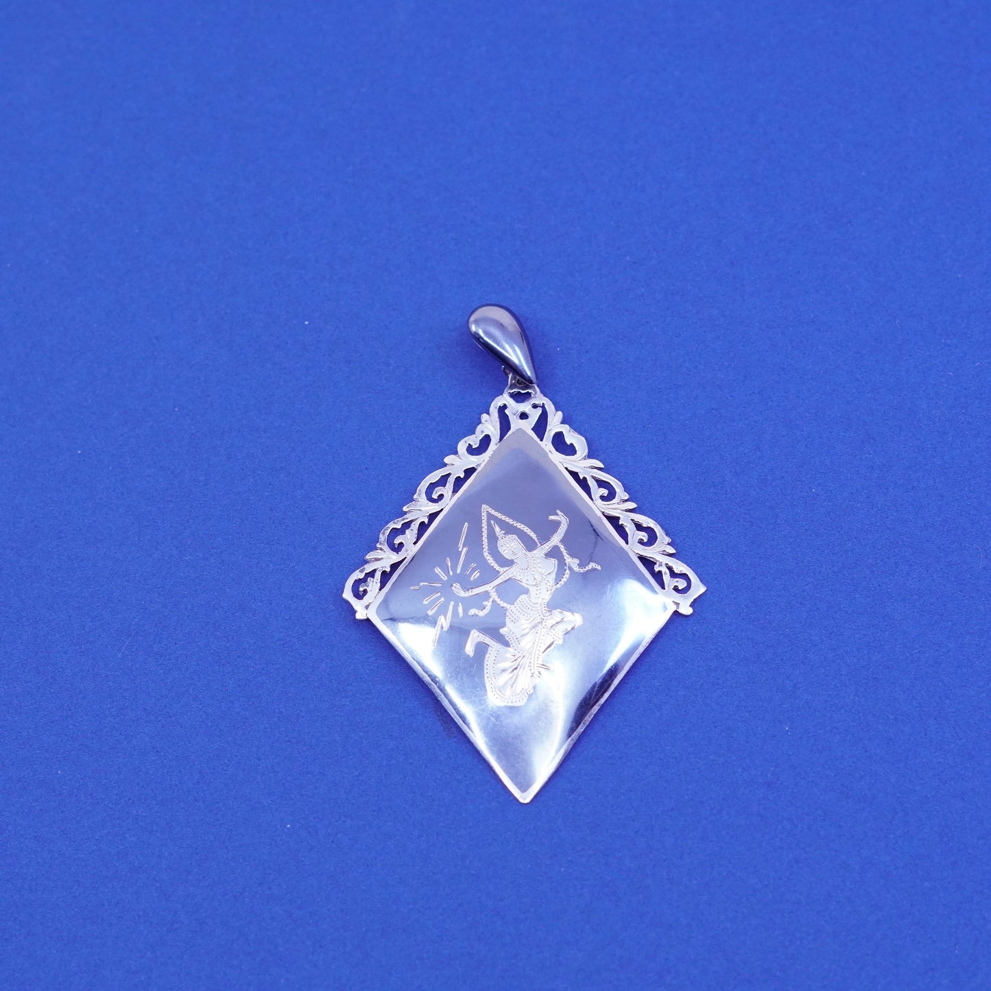 vtg Sterling 925 silver handmade diamond shaped pendant with goddess pattern