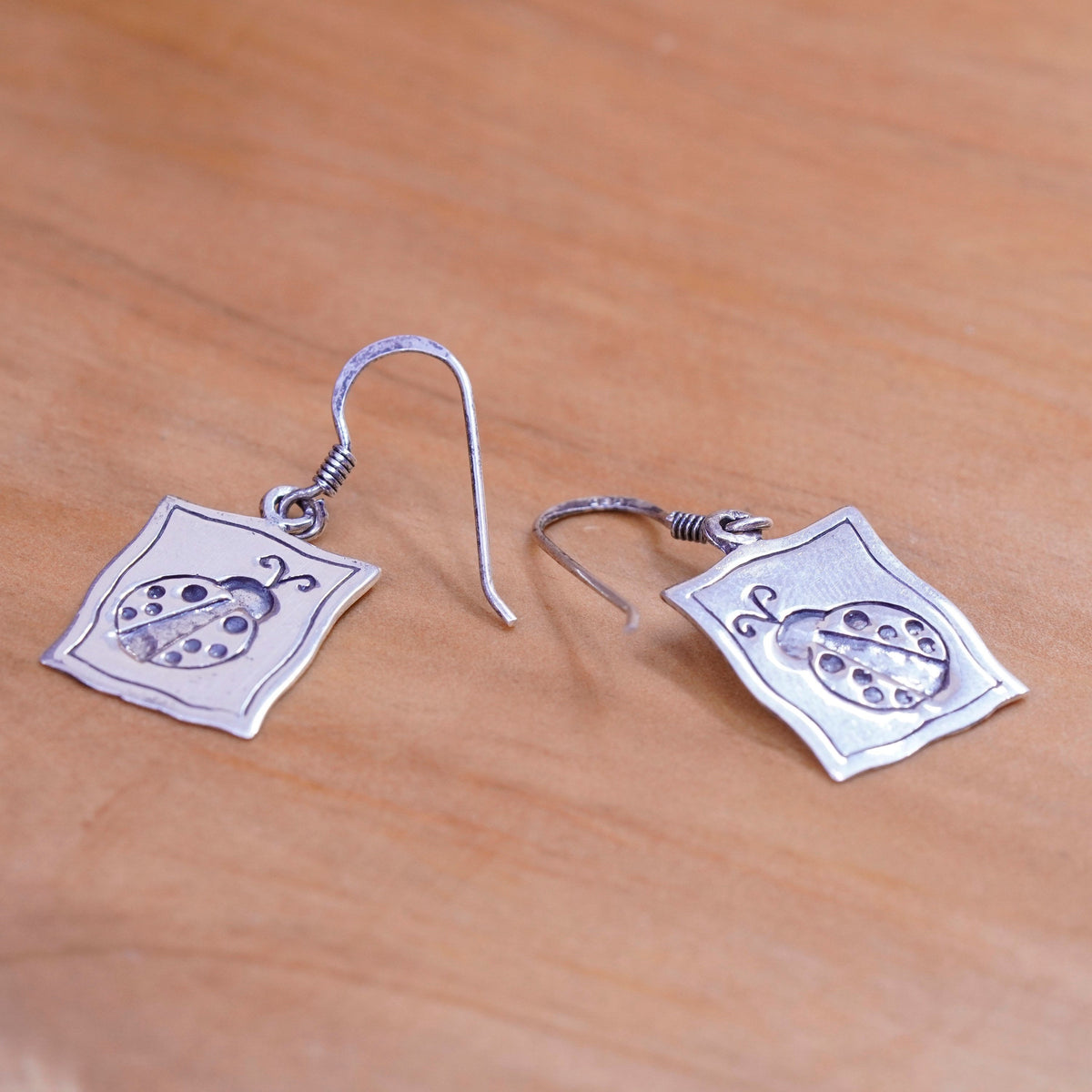 Vintage mexico Sterling silver handmade earrings, 925 tag with lady big relief
