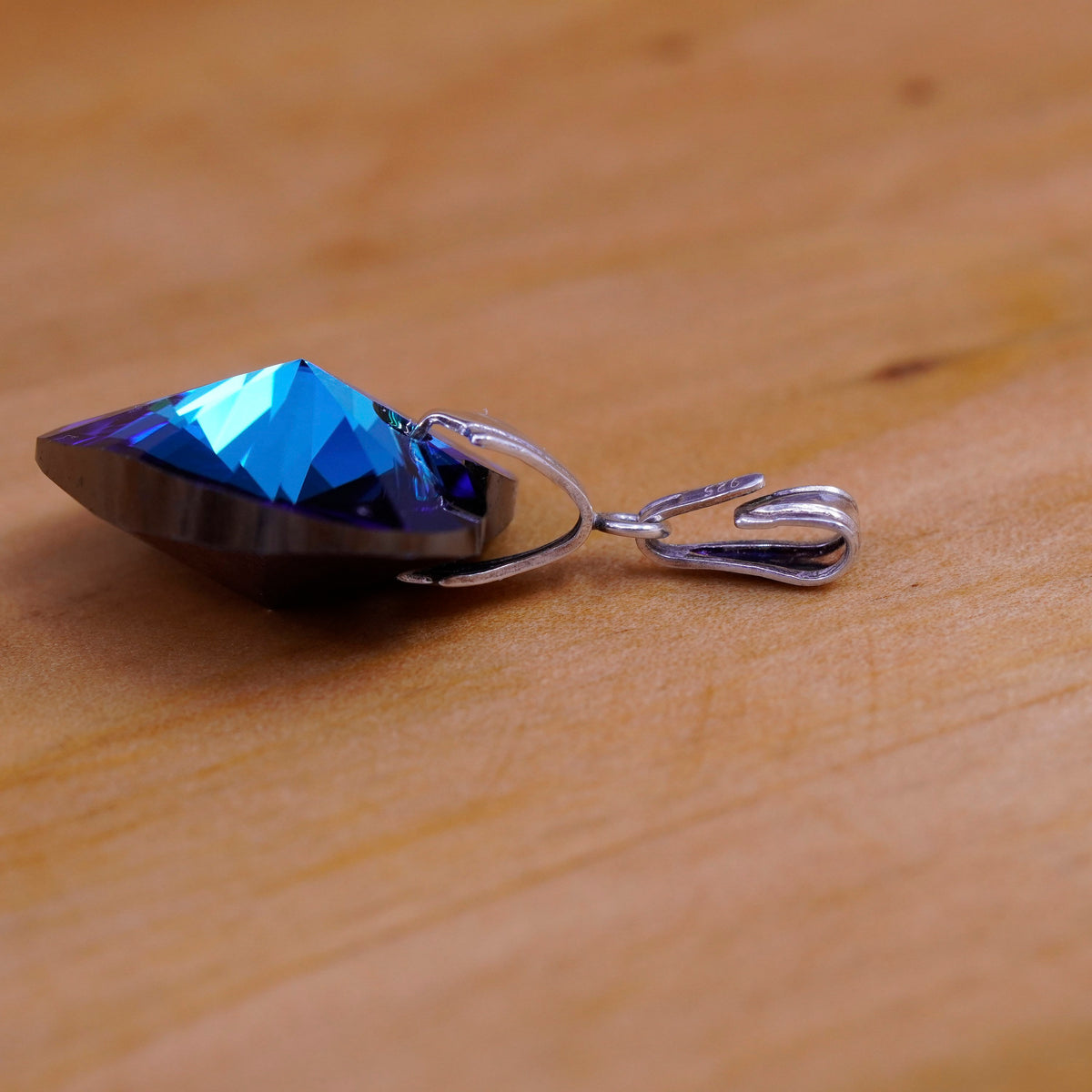 Vintage Sterling 925 silver heart shaped pendant with blue Swarovski crystal