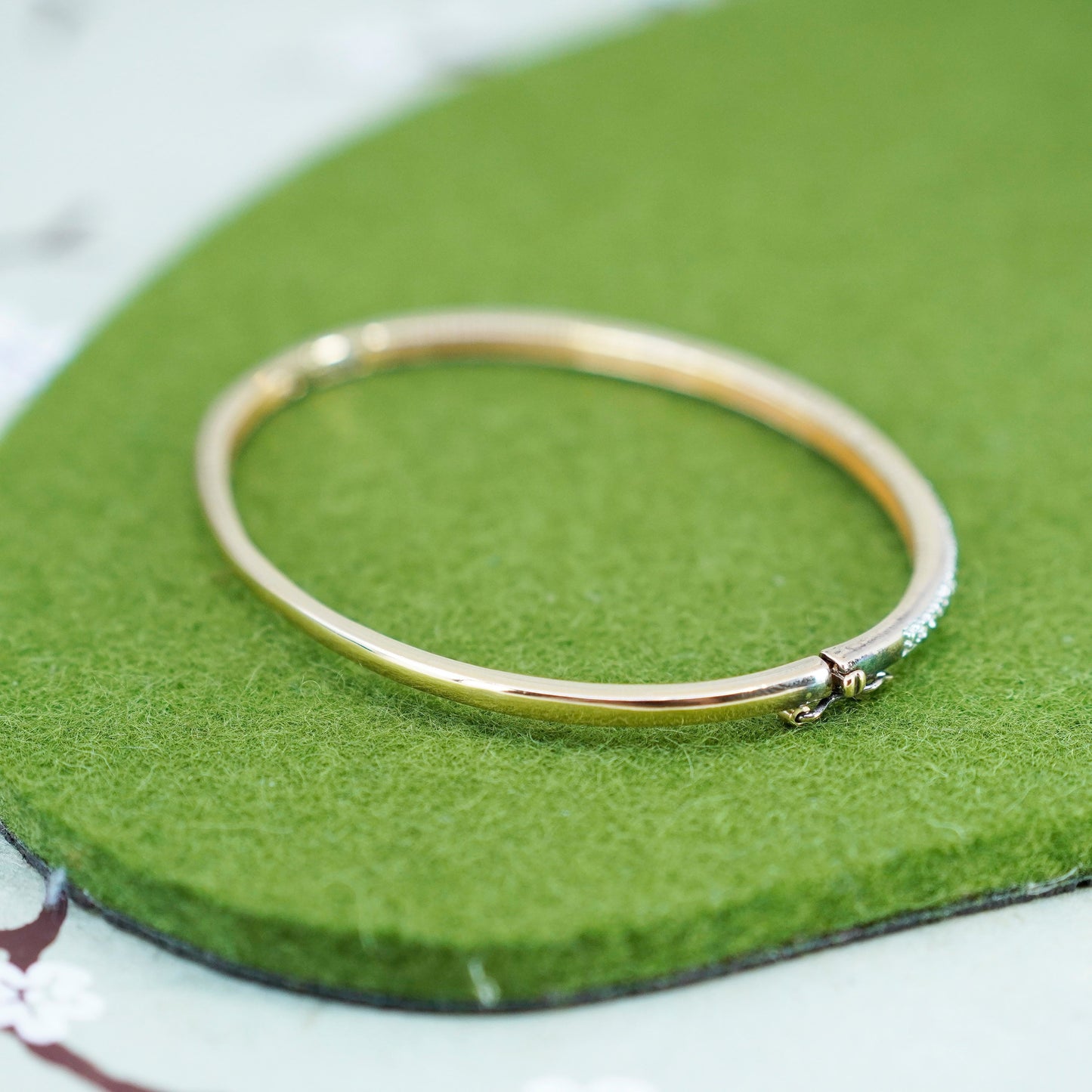 6.5”, vermeil gold over Sterling silver hinged bangle bracelet with diamond
