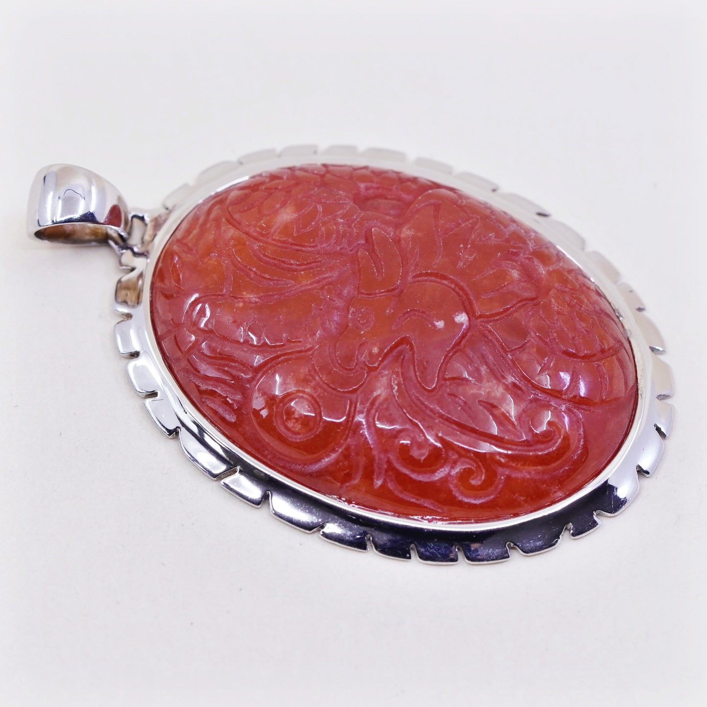 Vintage sterling 925 silver handmade pendant with carved carnelian