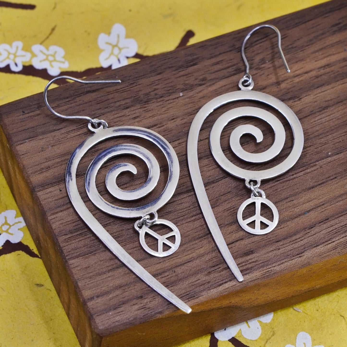 Vintage Sterling 925 silver handmade earrings with swirly peace CND charm