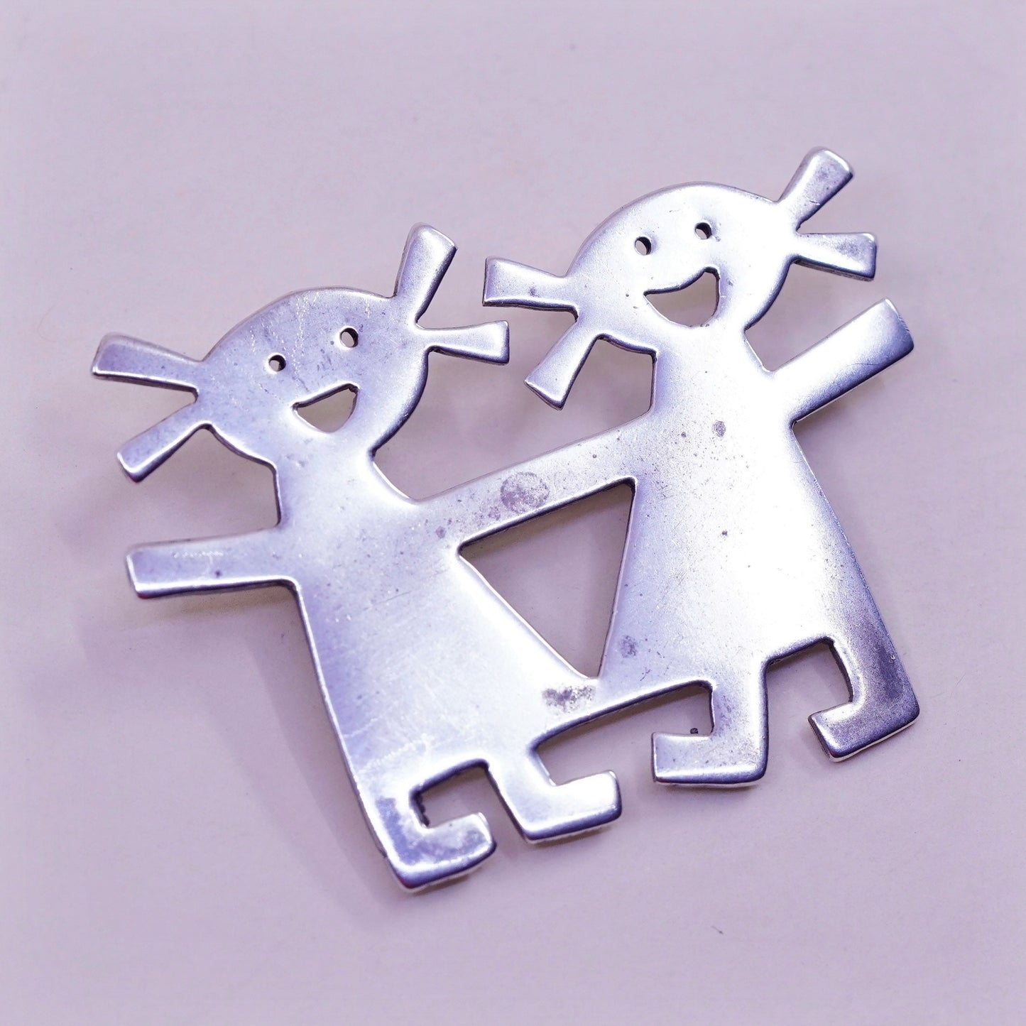 Vintage sterling 925 silver handmade brooch, two girls holding hands