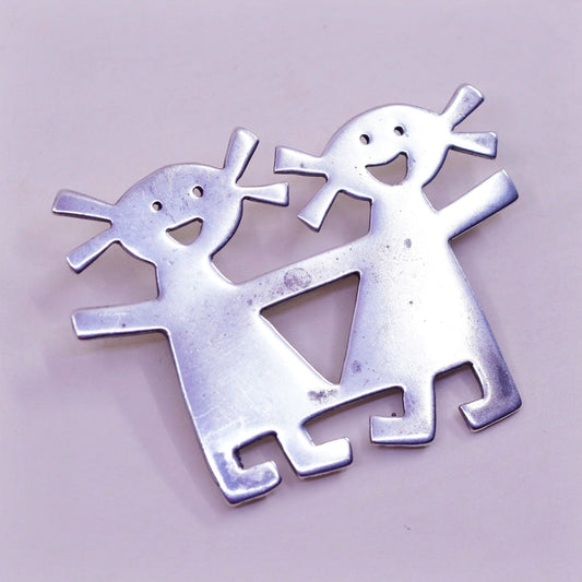 Vintage sterling 925 silver handmade brooch, two girls holding hands