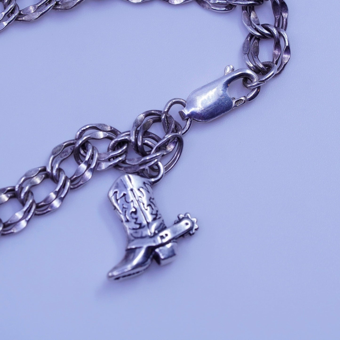 7.5”, Sterling 925 silver bracelet, curb chain K pineapple riding boot charms