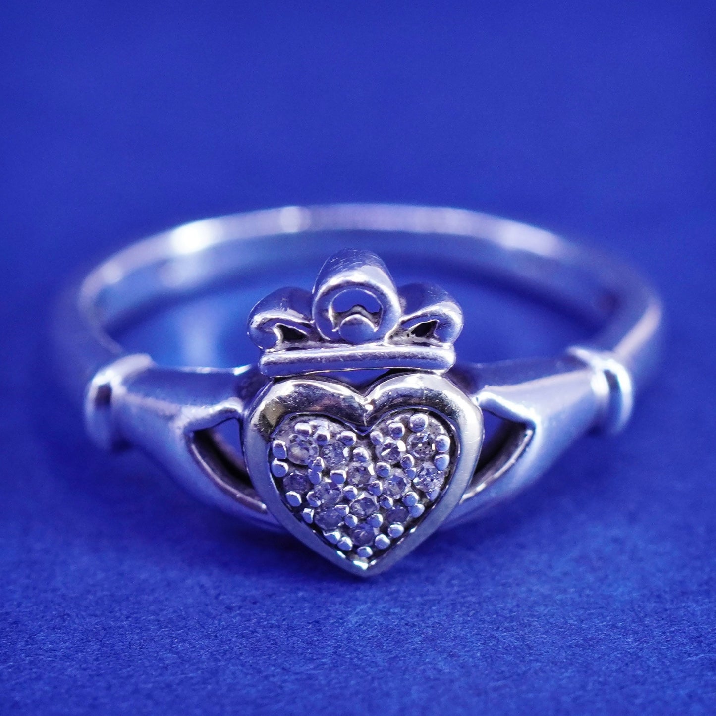 Size 5.5, sterling 925 silver claddagh ring with 14K gold heart and diamond
