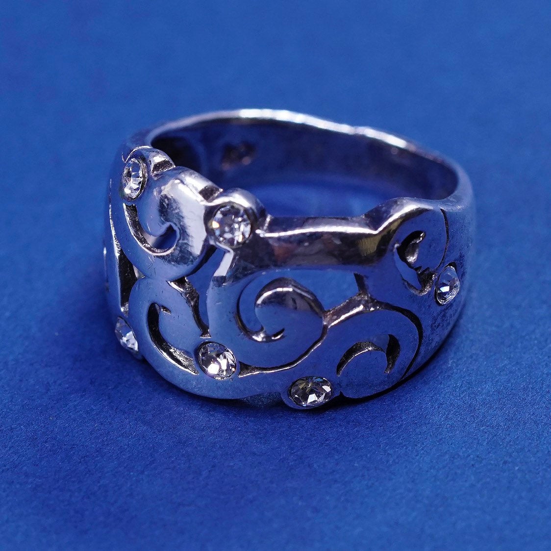 sz 7 vtg Sterling silver handmade ring, 925 swirl band w/ cz