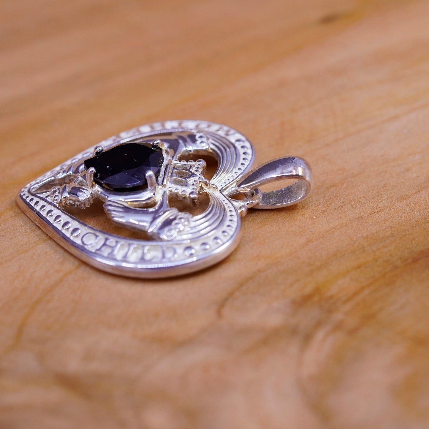 Vintage Ireland sterling silver claddagh pendant, holding heart 925 charm ruby