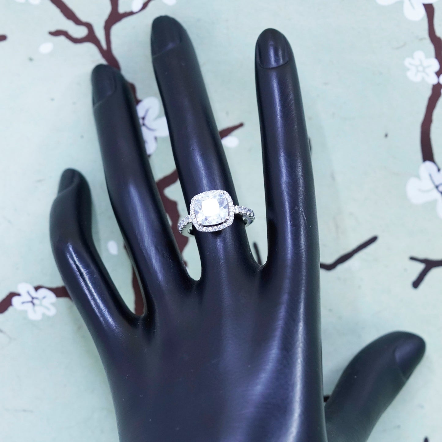 Size 6, Sterling 925 silver engagement ring with emerald cut CZ and cluster cz
