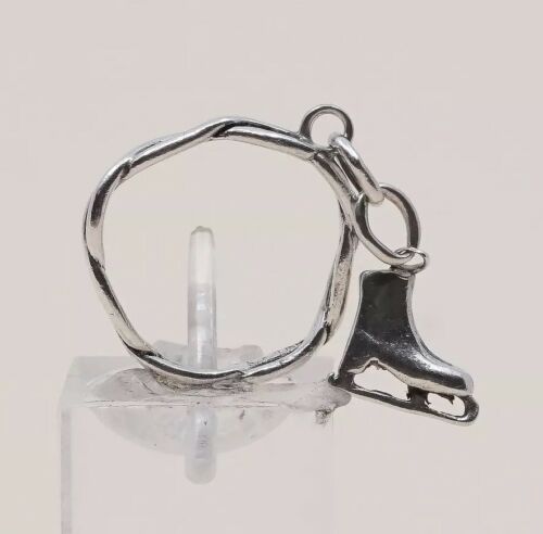 Size 4, Vtg Sterling Silver handmade Ring. 925 Entwined band W/ Skating Shoe