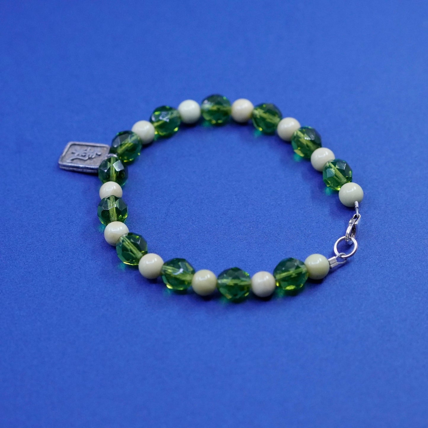 7”, sterling 925 silver handmade bracelet w/ green crystal beads energy charm