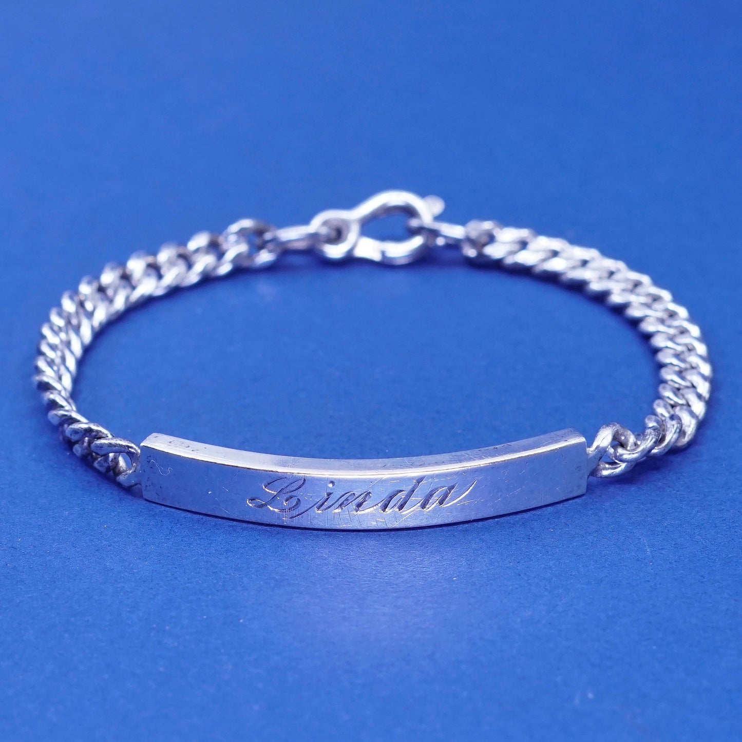 6.25”, vintage EA Sterling silver bracelet, curb chain with name Linda bar