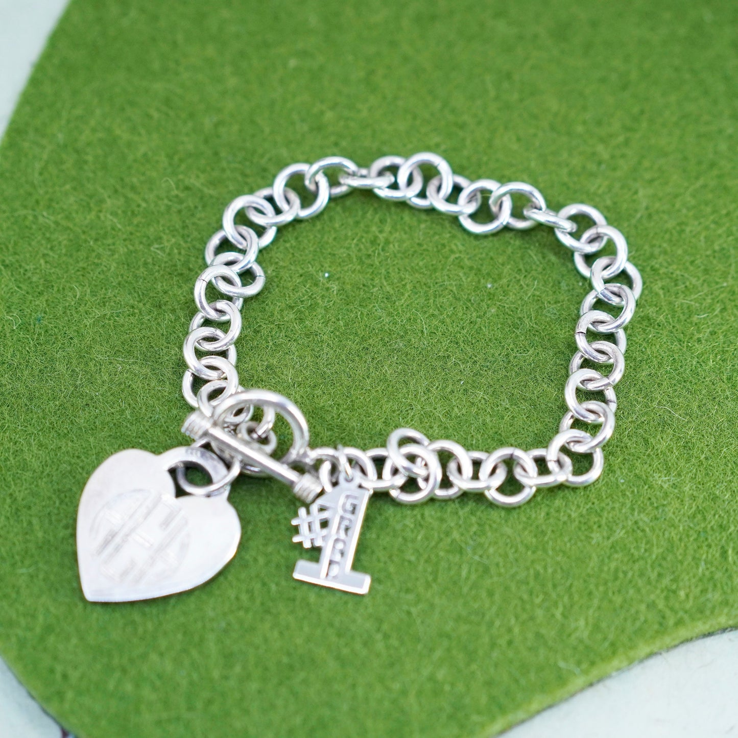6.75”, sterling silver circle bracelet, 925 chain heart charm monogram “AEH”