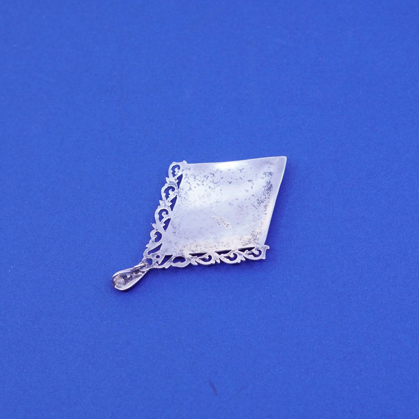 vtg Sterling 925 silver handmade diamond shaped pendant with goddess pattern