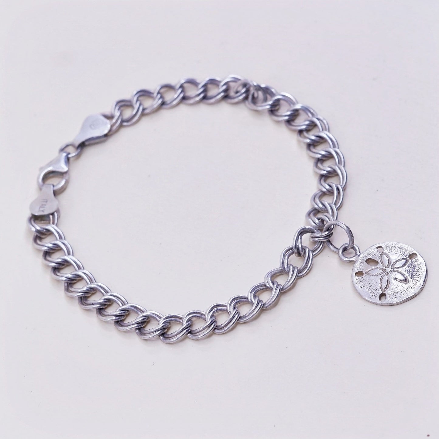 6.75”, sterling silver double curb chain, 925 bracelet w/ sand dollar charm