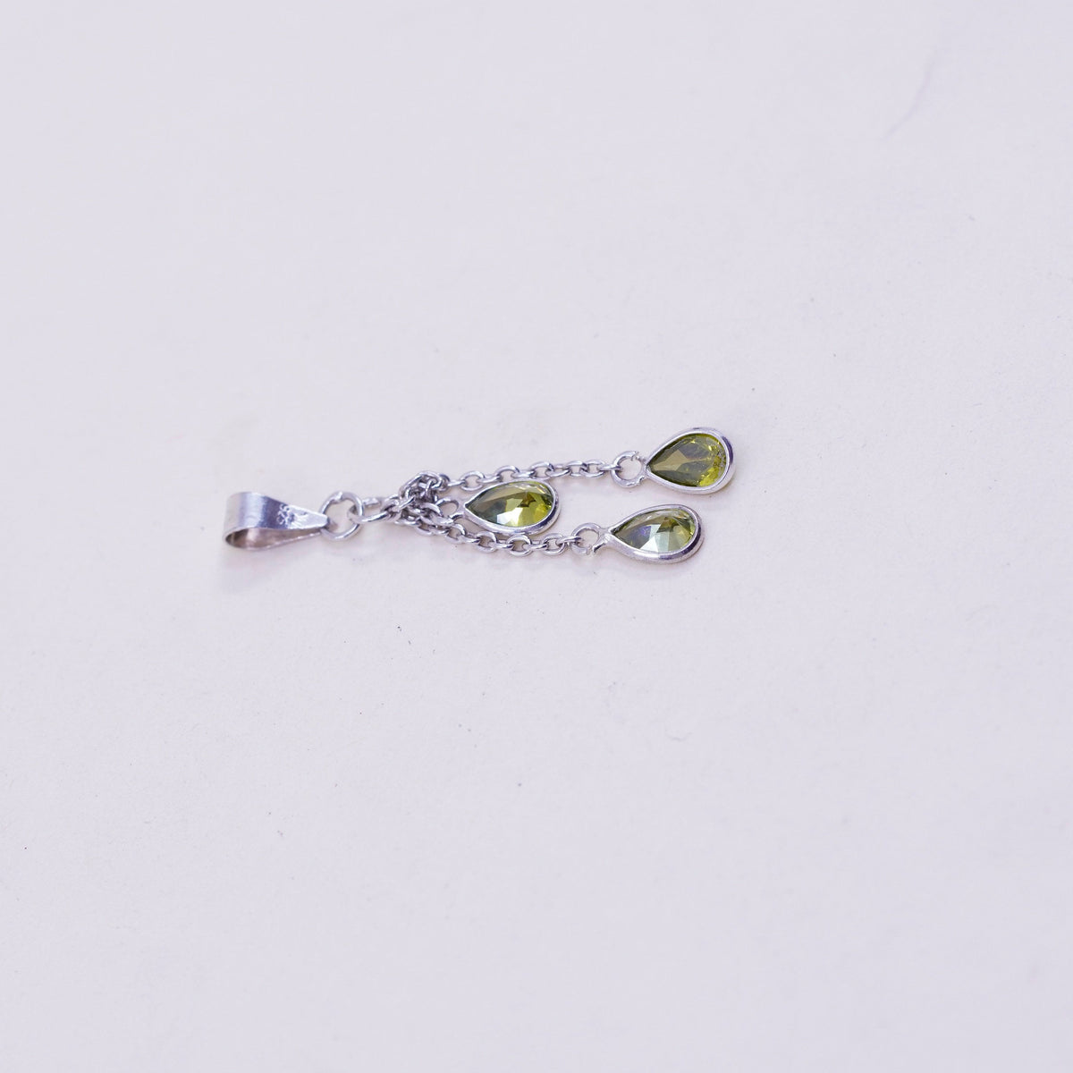 Vintage handmade Sterling 925 silver angel pendant with teardrop peridot