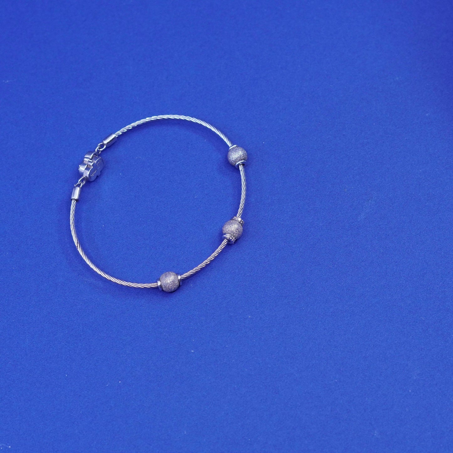 7”, stainless steel cable bracelet with Sterling 925 silver glittering beads