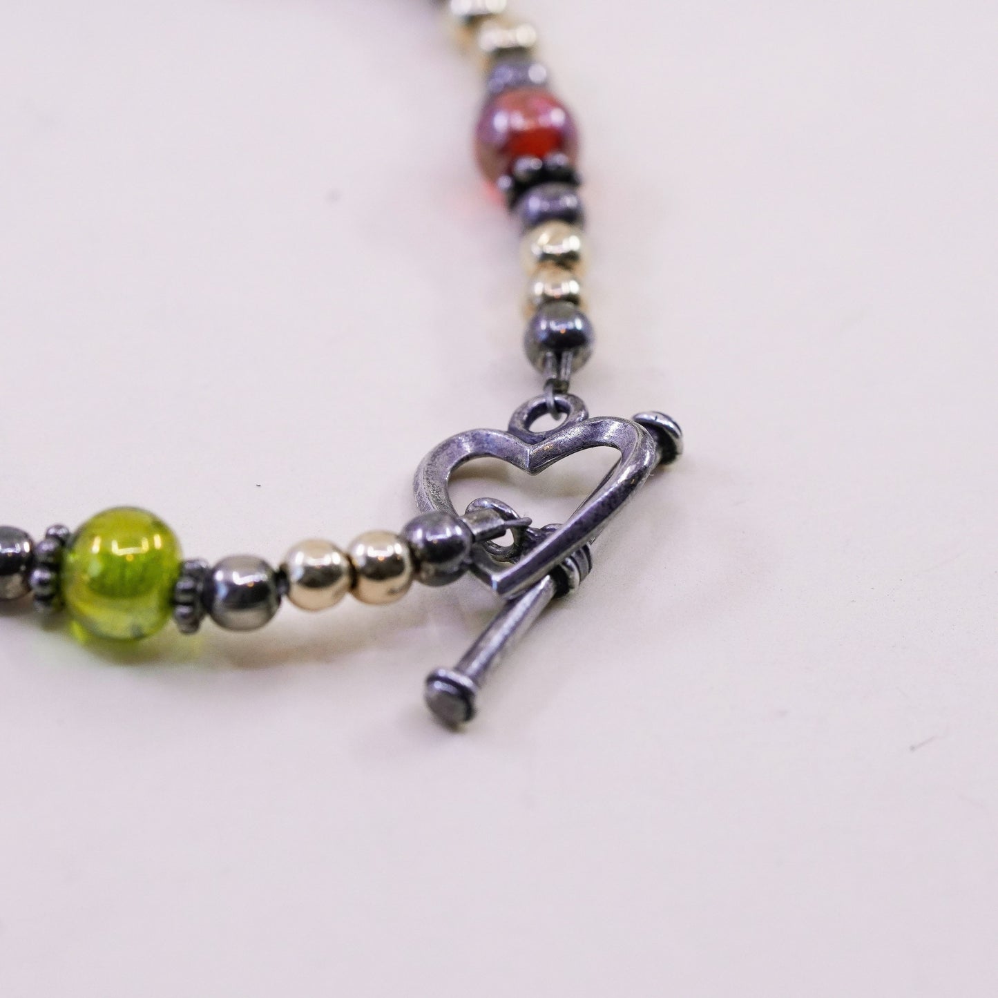 7”, Sterling 925 silver bracelet with 14K gold beads and heart toggle closure