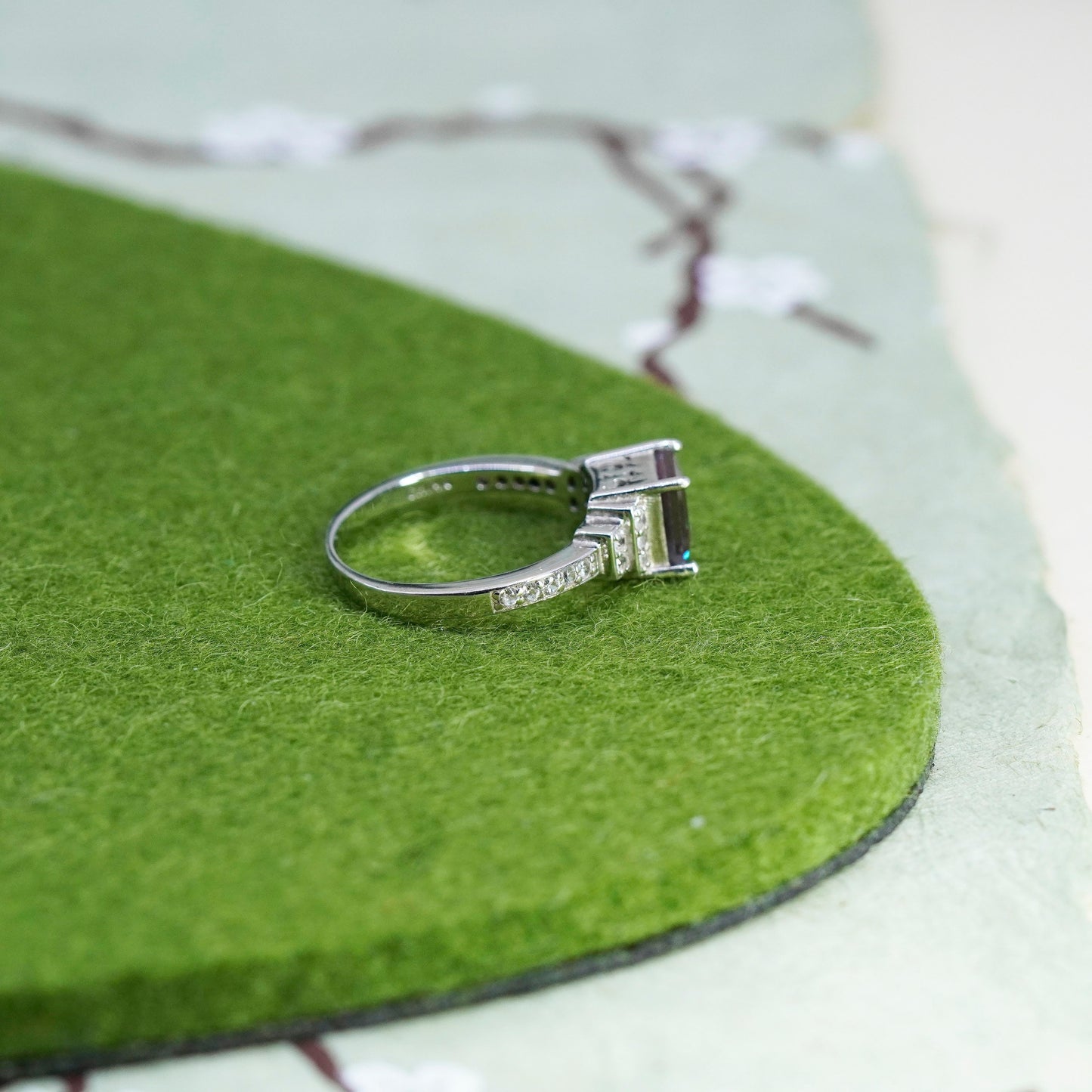 Size 9.25, vintage 925 Sterling silver ring with topaz and cz around