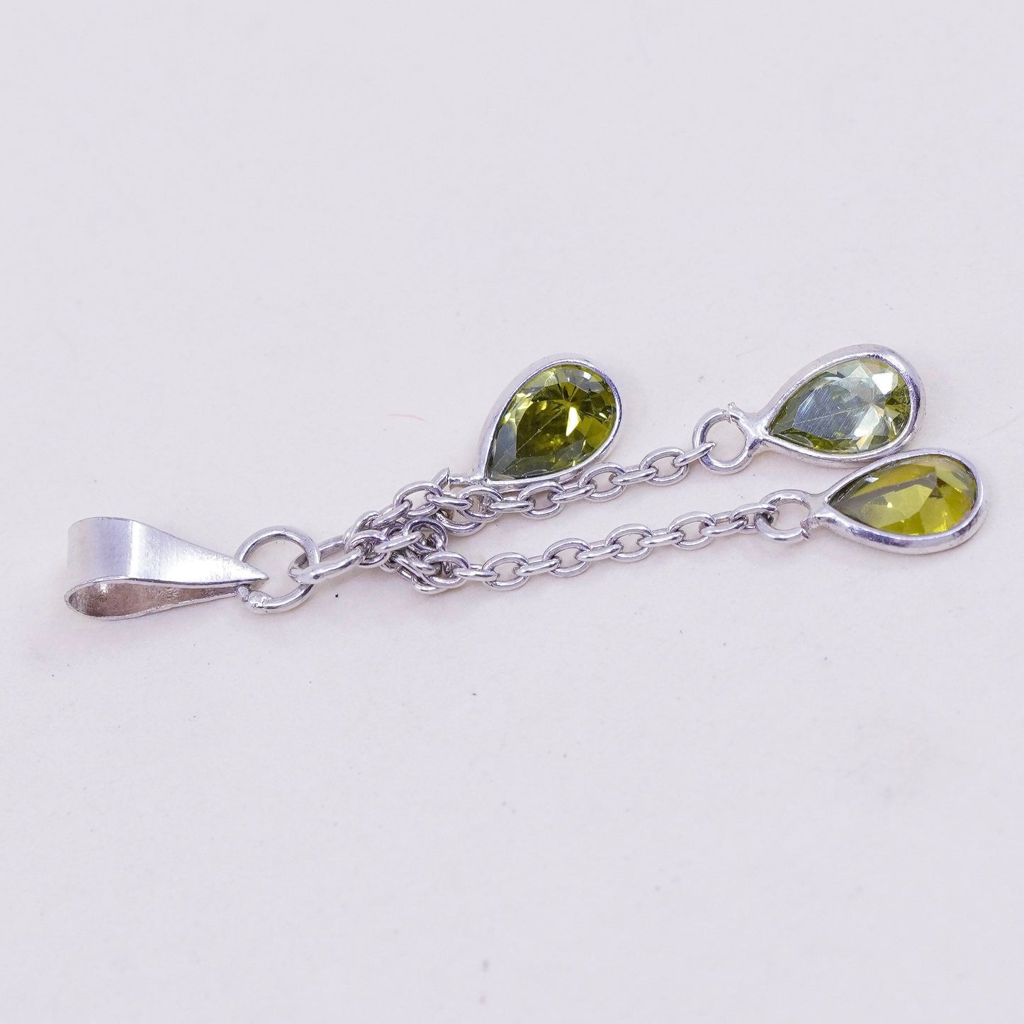 Vintage handmade Sterling 925 silver angel pendant with teardrop peridot