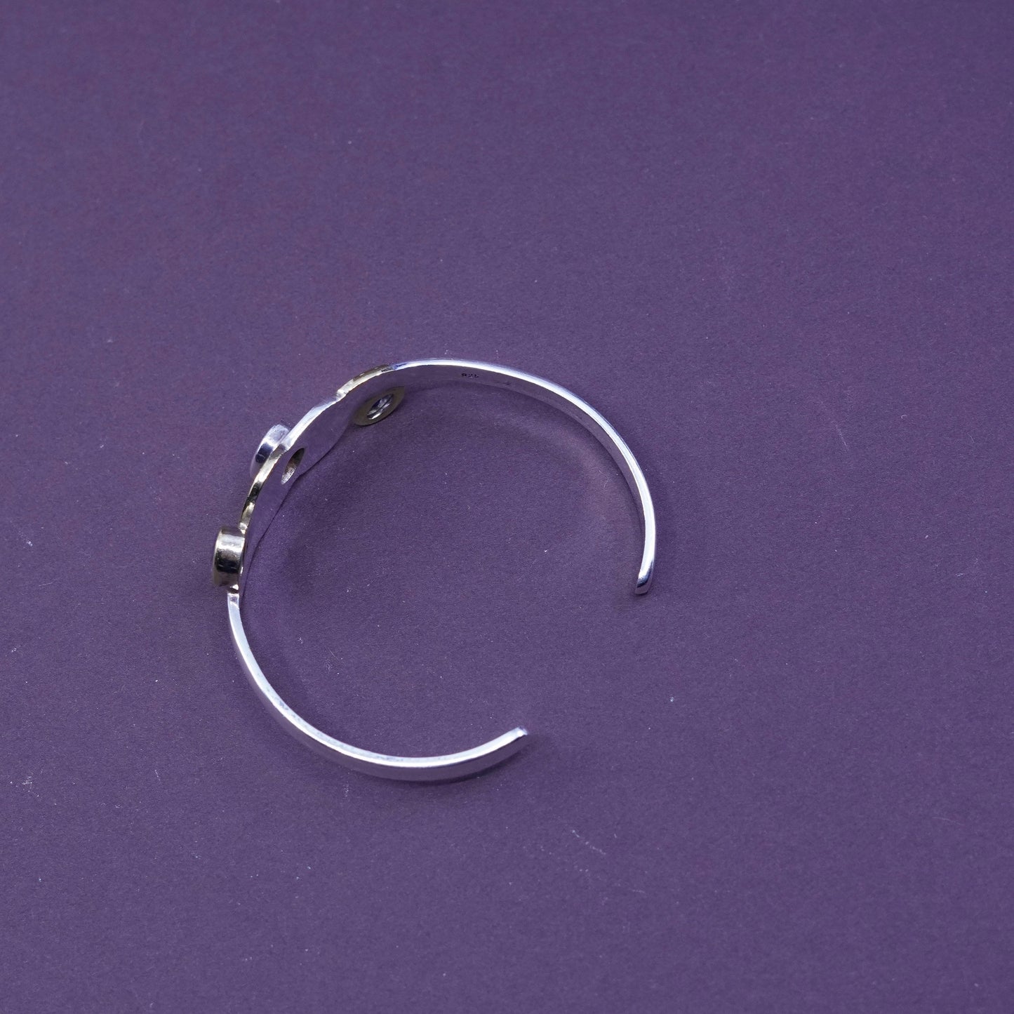 6”, two tone sterling silver bracelet, 925 wavy cuff with brass and ruby topaz