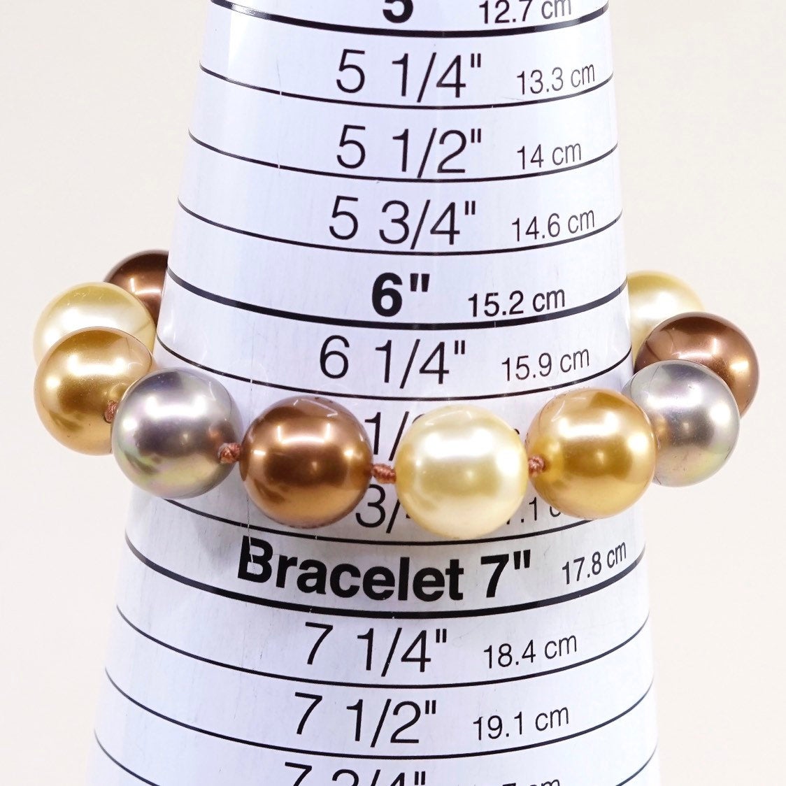 6.5”, Vintage handmade bracelet, gold and earth tone pearl beads w/ 925 clasp