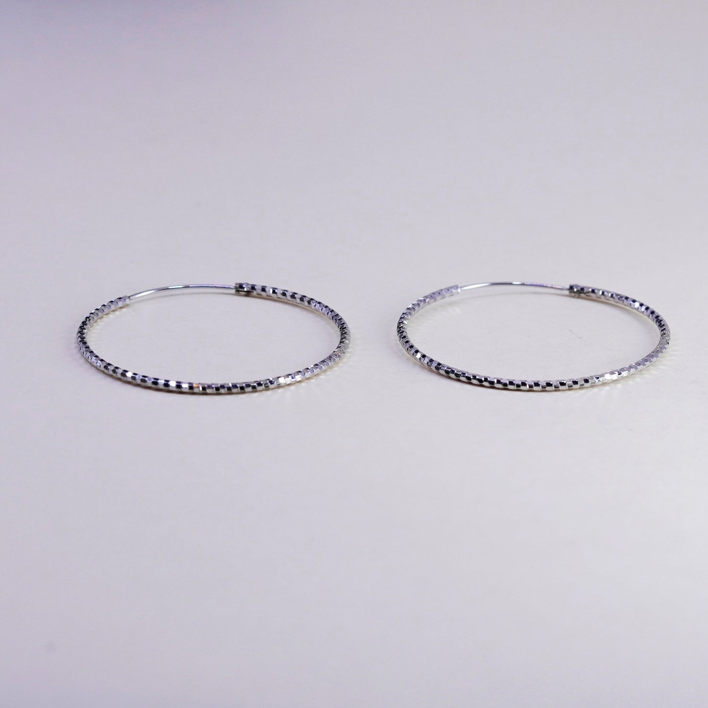 1.75”, vtg sterling silver loop earrings, textured minimalist primitive hoops