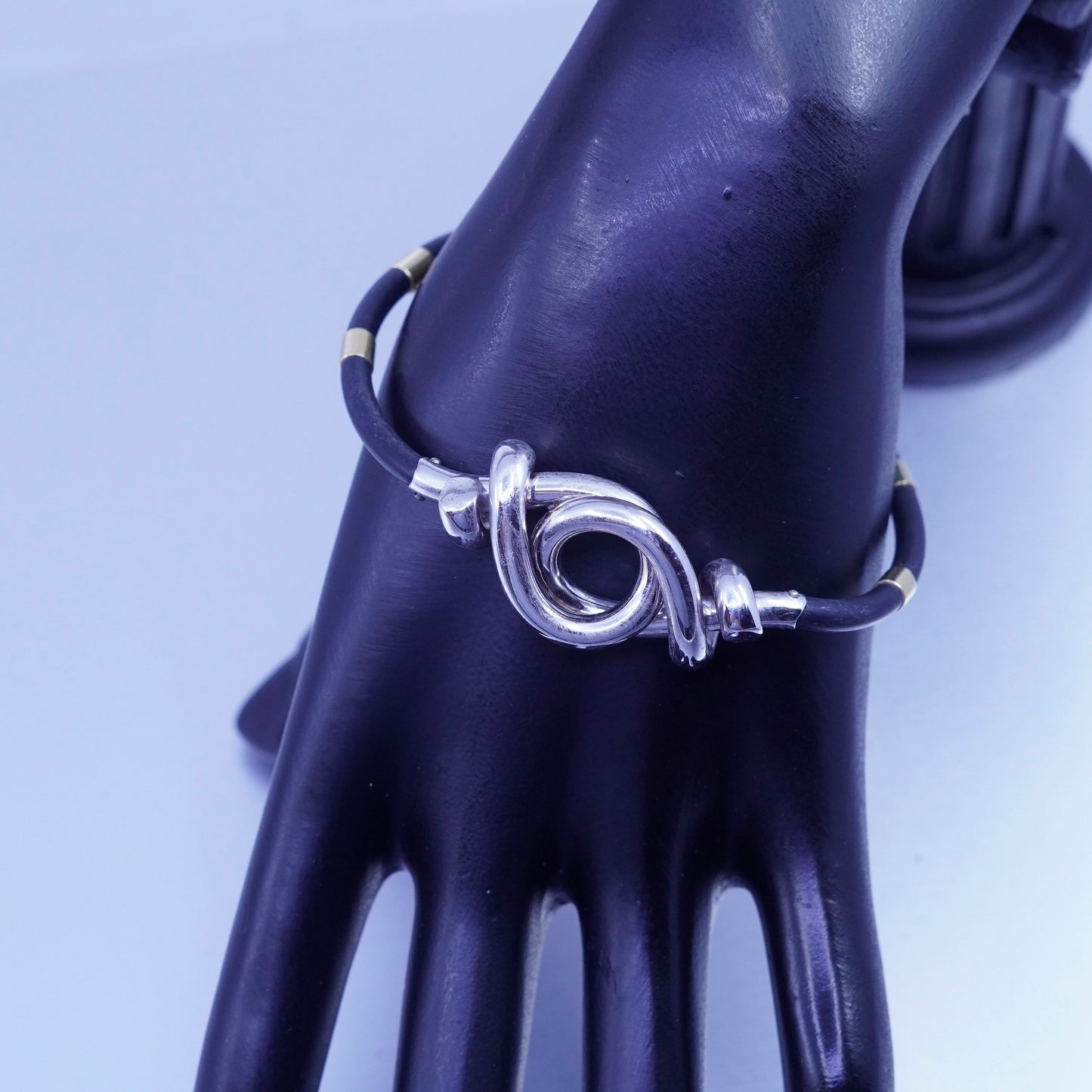 6.75”, sterling 925 silver knot bracelet with 14K gold tube black rubber chain