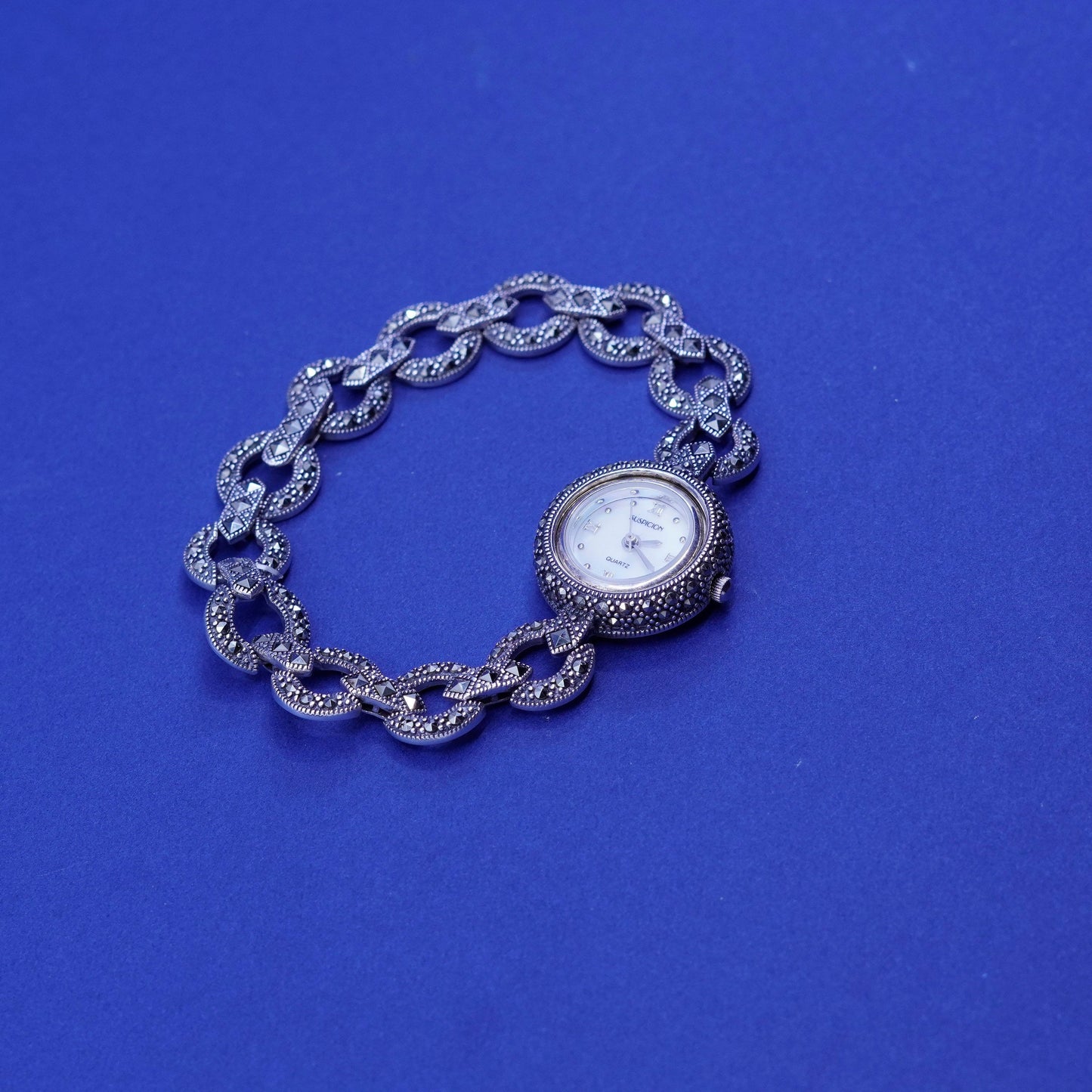 7”, Vtg suspicion lady watch with sterling 925 silver band with Marcasite