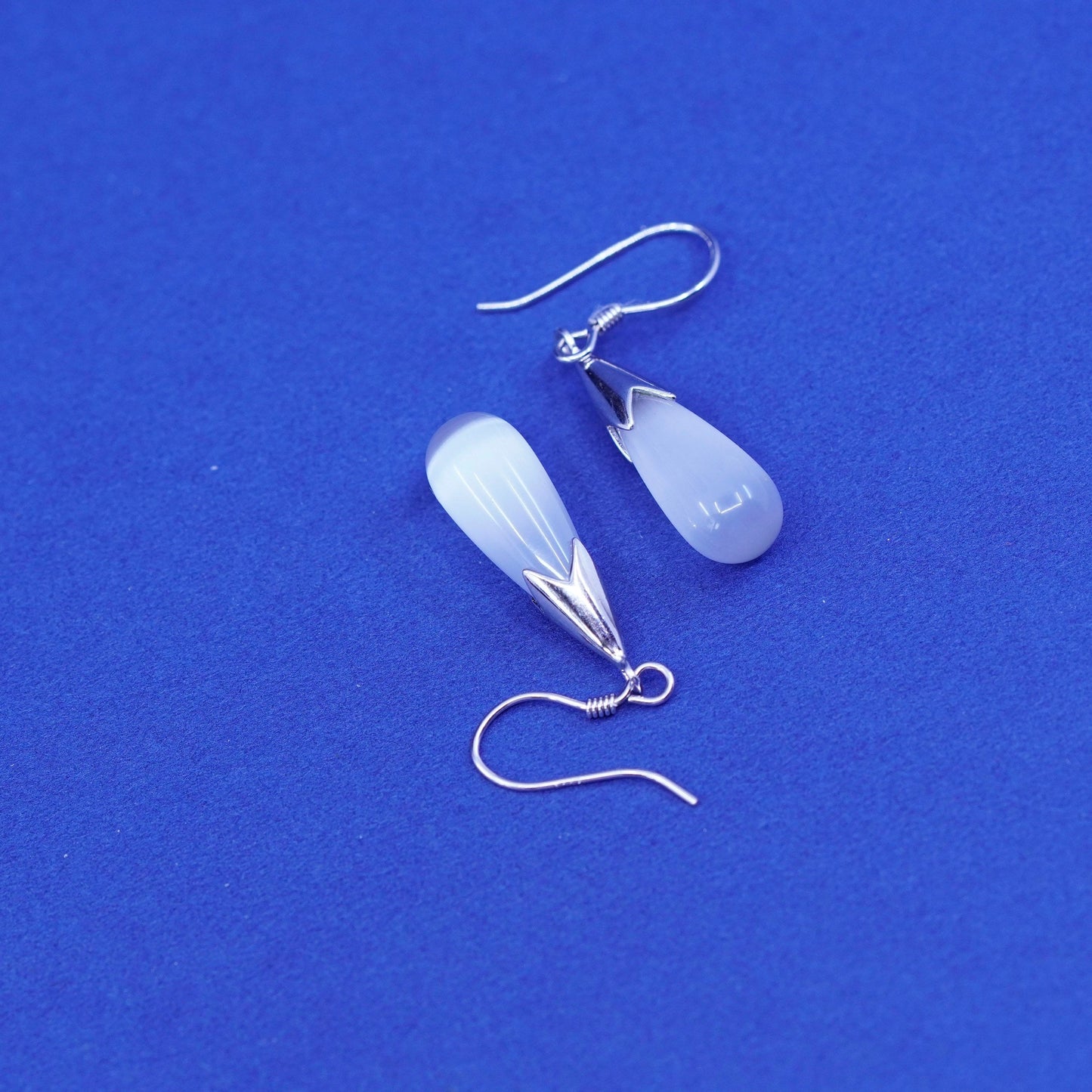 1.25”, Vintage sterling 925 silver handmade earrings w/ teardrop white cats eye