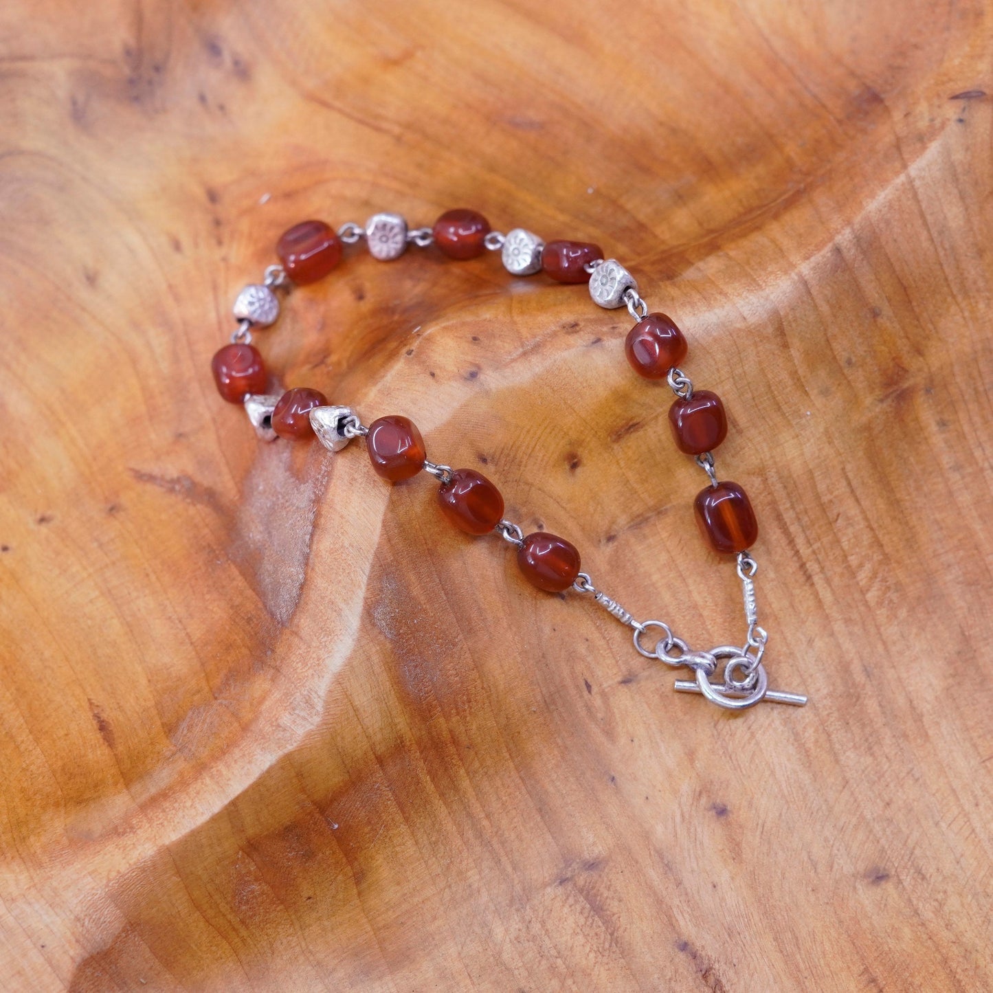 7.75”, vtg Sterling silver handmade garnet beads bracelet with toggle closure