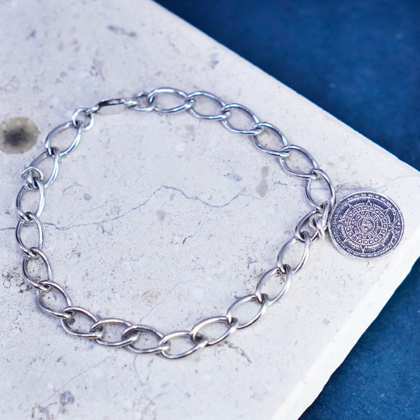 7.25”, Sterling silver bracelet, Mexico 925 oval chain w/ Mayan calendar charm