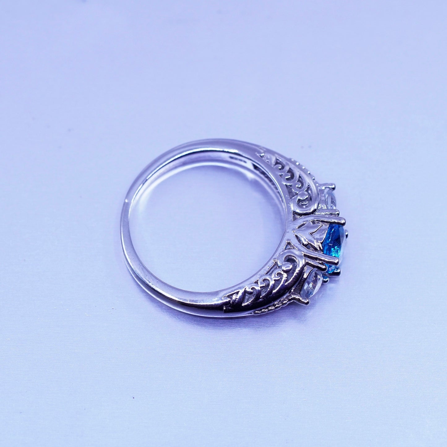 Size 7.75, vintage Sterling 925 silver handmade filigree ring with blue Cz